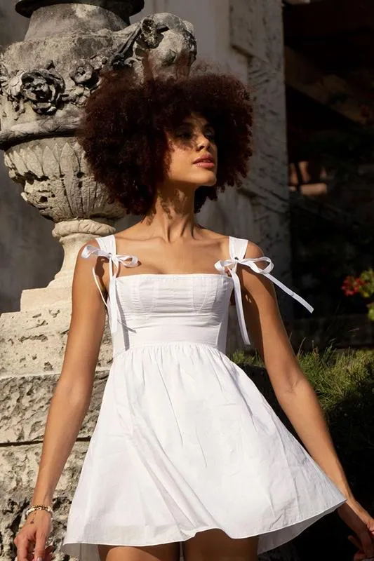 Kayla - Mini robe à bretelles avec nœud sur les épaules